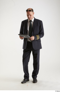 Jake Perry Pilot with IPad standing whole body 0001.jpg